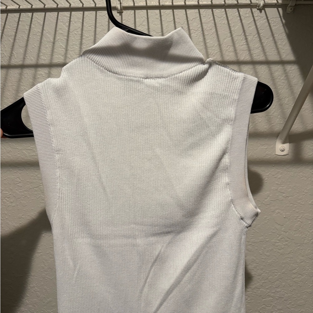 Sleeveless White Turtleneck Top